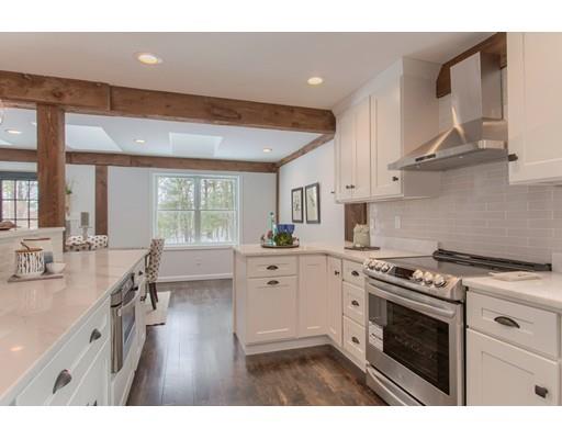 16 Longview Road Chelmsford, MA 01824 - Photo 12 of 30 a kitchen with a stove a sink and a refrigerator