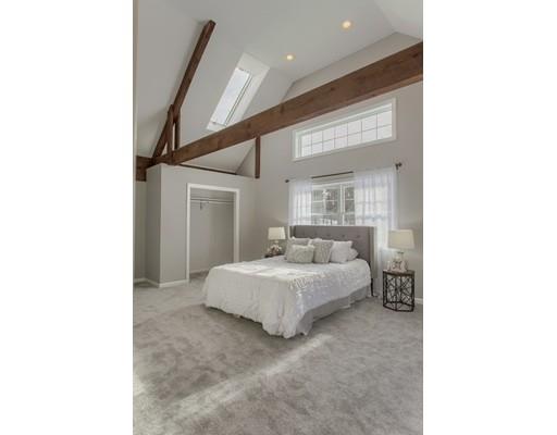 16 Longview Road Chelmsford, MA 01824 - Photo 18 of 30 a bedroom with a bed and a mirror