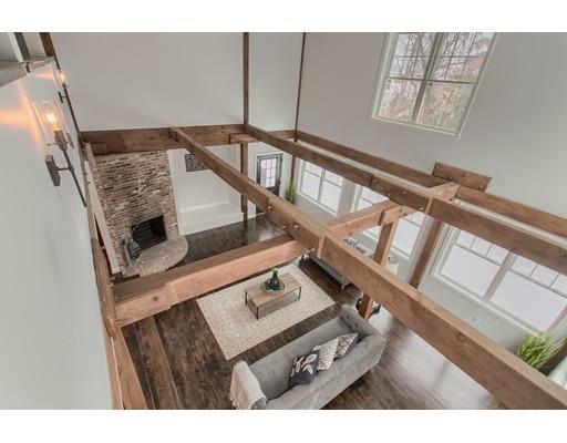 16 Longview Road Chelmsford, MA 01824 - Photo 25 of 30 a living room with furniture and a fireplace