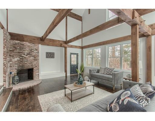 16 Longview Road Chelmsford, MA 01824 - Photo 7 of 30 a living room with furniture and a fireplace