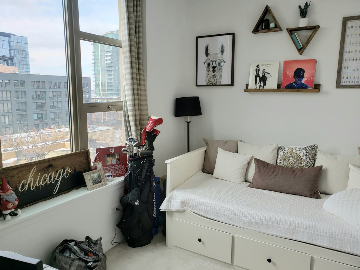 200 North Jefferson Street, Unit 601 Chicago, IL 60661 - Photo 11 of 27 a bedroom with a bed and wooden floor