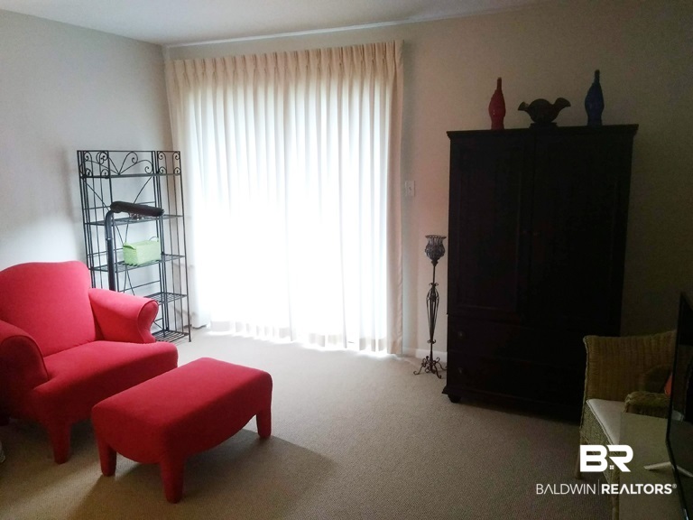 710 South Mobile Street, Unit 23 Fairhope, AL 36532 - Photo 17 of 42 Living room to balcony