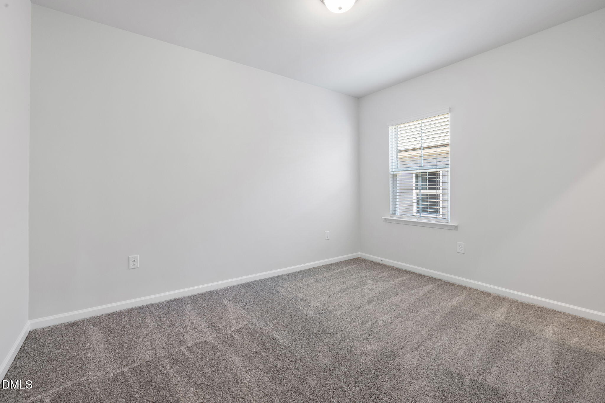 348 Broomside Avenue Raleigh, NC 27603 - Photo 20 of 33 an empty room with a window