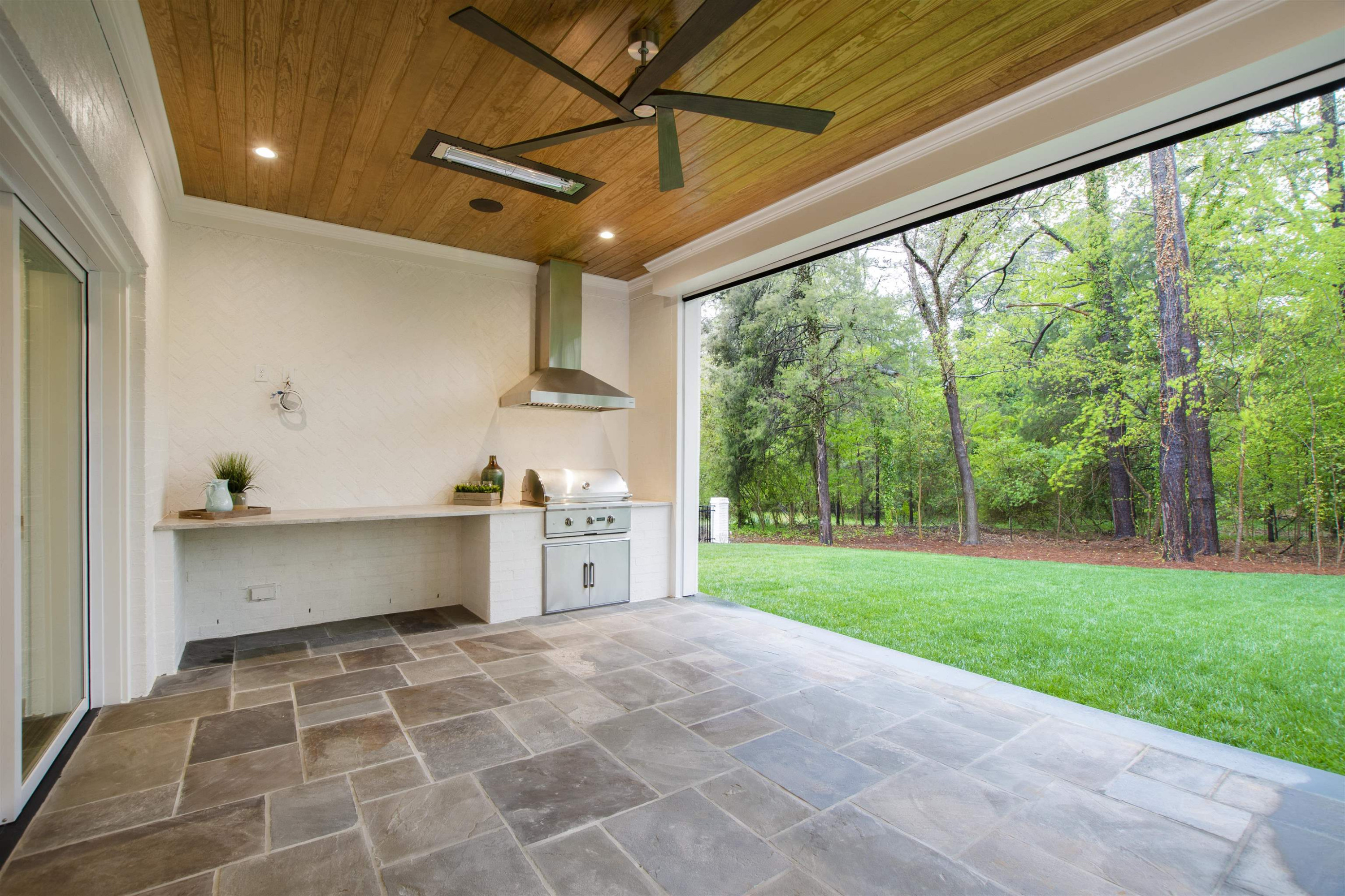 4813 Rampart Street Raleigh, NC 27609 - Photo 6 of 7 a view of a room with a sink and garden