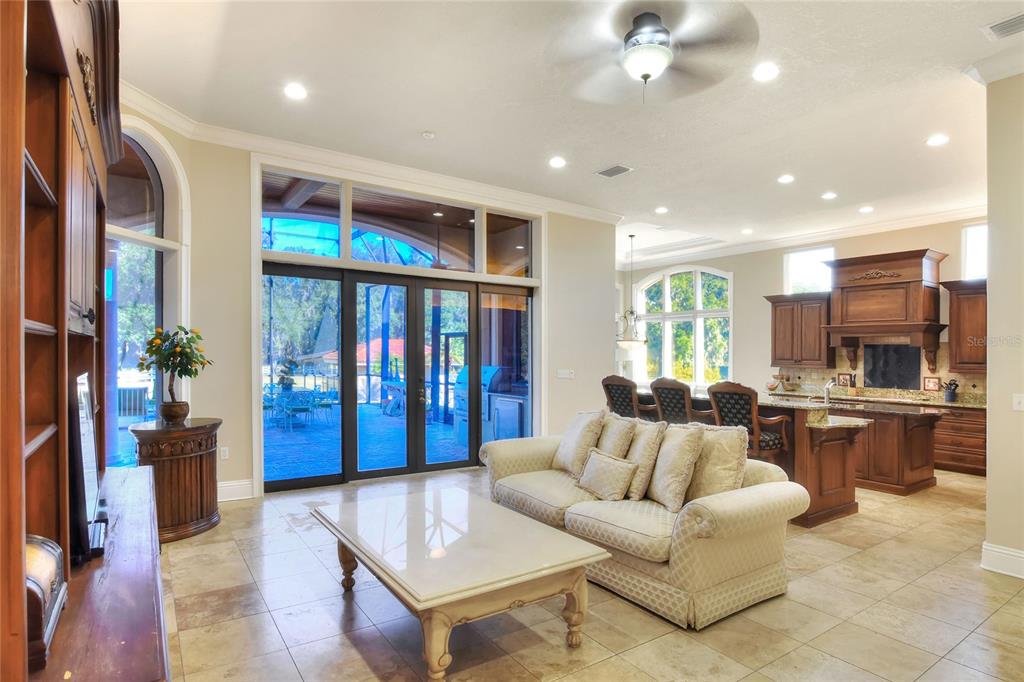 4215 Sb Merrion Road Lakeland, FL 33810 - Photo 21 of 95 a living room with furniture kitchen and a large window