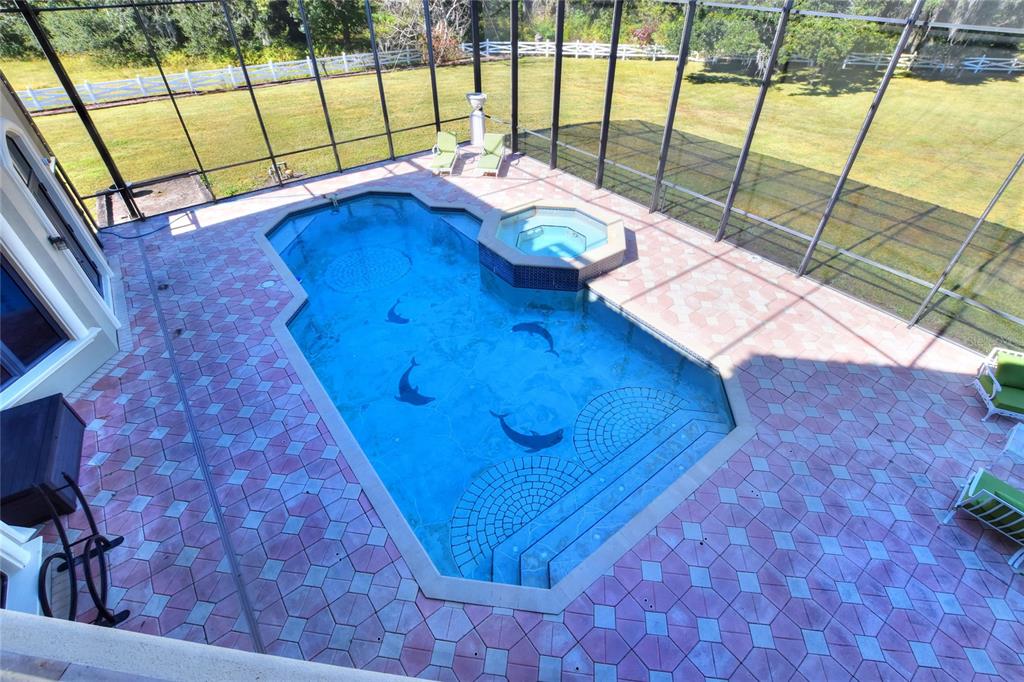 4215 Sb Merrion Road Lakeland, FL 33810 - Photo 26 of 95 a view of a chairs and table in the balcony