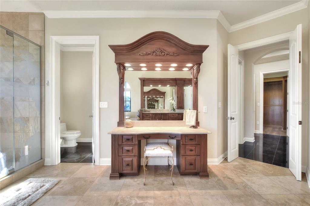 4215 Sb Merrion Road Lakeland, FL 33810 - Photo 41 of 95 a view of a hallway with bathroom and front door