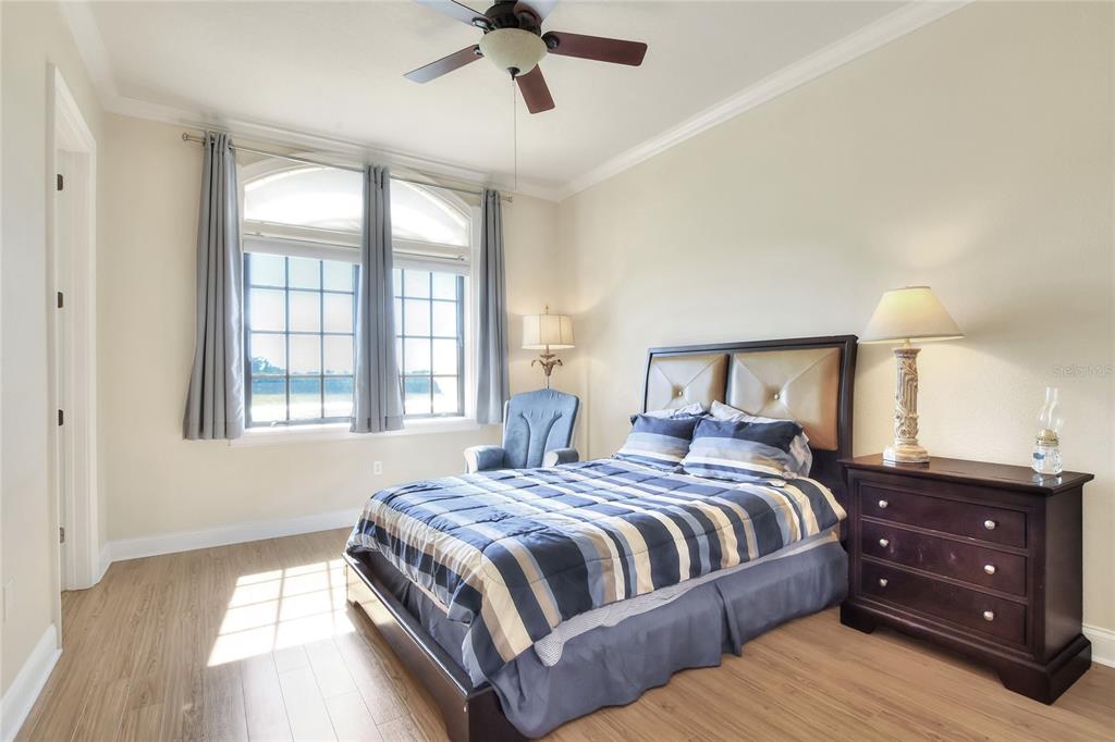 4215 Sb Merrion Road Lakeland, FL 33810 - Photo 73 of 95 a bedroom with a bed and a night stand