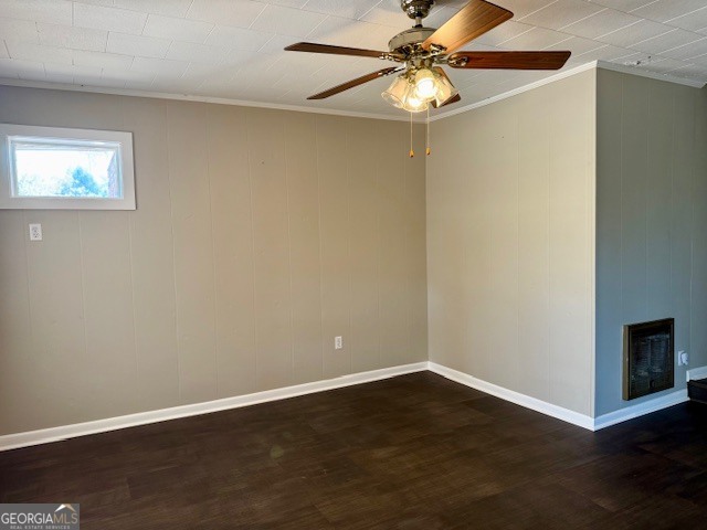 405 South Leroy Street Metter, GA 30439 - Photo 11 of 25 an empty room with wooden floor chandelier fan and windows