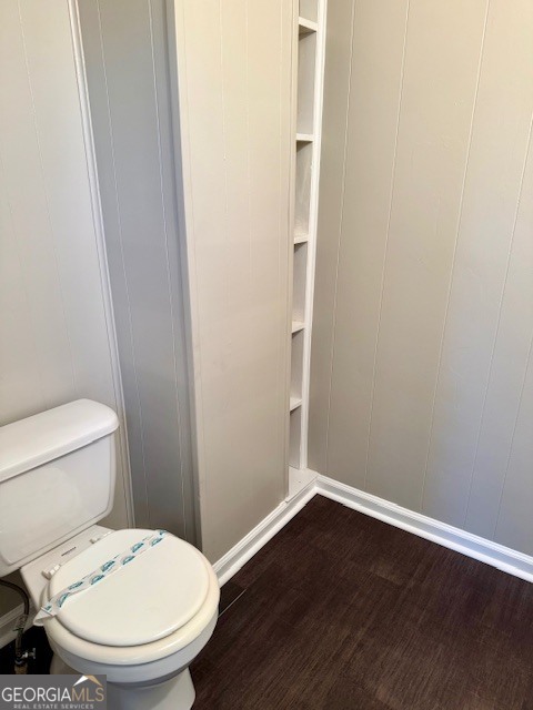 405 South Leroy Street Metter, GA 30439 - Photo 14 of 25 a white toilet sitting next to a small bathroom
