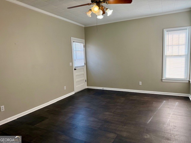 405 South Leroy Street Metter, GA 30439 - Photo 19 of 25 a view of an empty room with wooden floor and a window