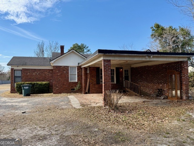 405 South Leroy Street Metter, GA 30439 - Photo 23 of 25 a front view of a house with a yard