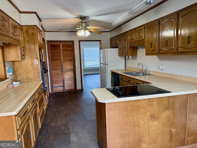 405 South Leroy Street Metter, GA 30439 - Photo 9 of 25 a kitchen that has a sink a stove and a microwave oven in it