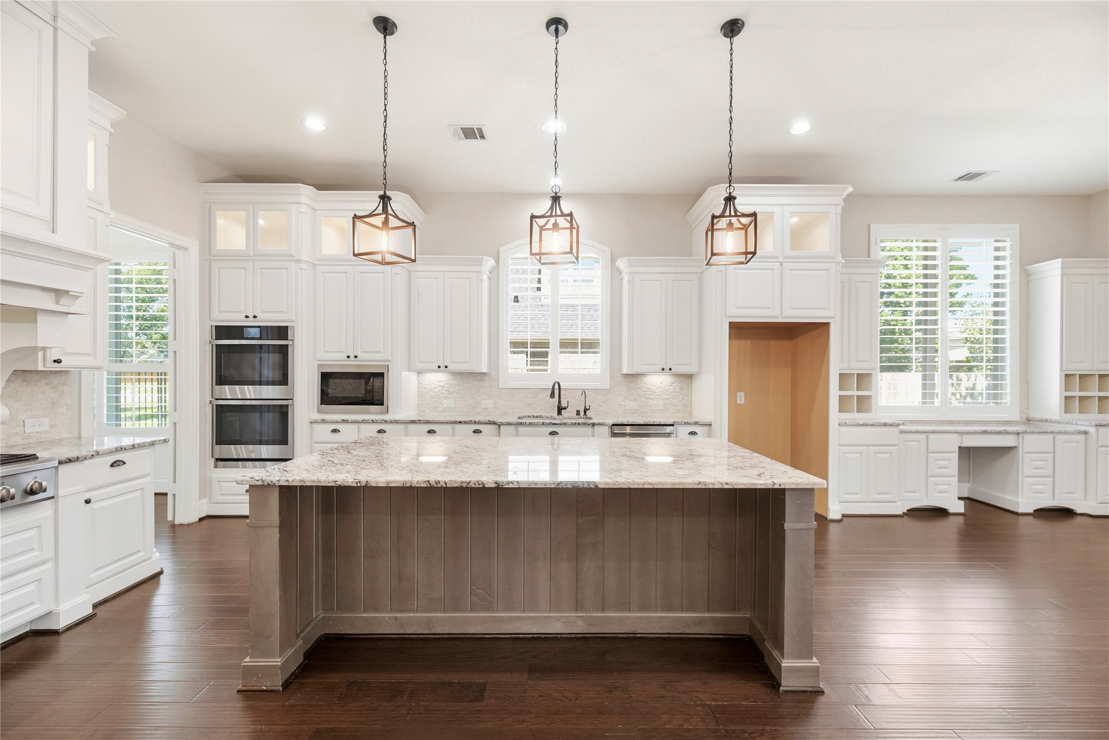 28226 South Firethorne Road Katy, TX 77494 - Photo 4 of 39 This culinary center is a chef’s dream, featuring premium granite countertops, a large island, and high-end stainless steel appliances. The open-concept design features custom soft-closing cabinetry and drawers, under-cabinet lighting, and a spacious walk-in pantry.