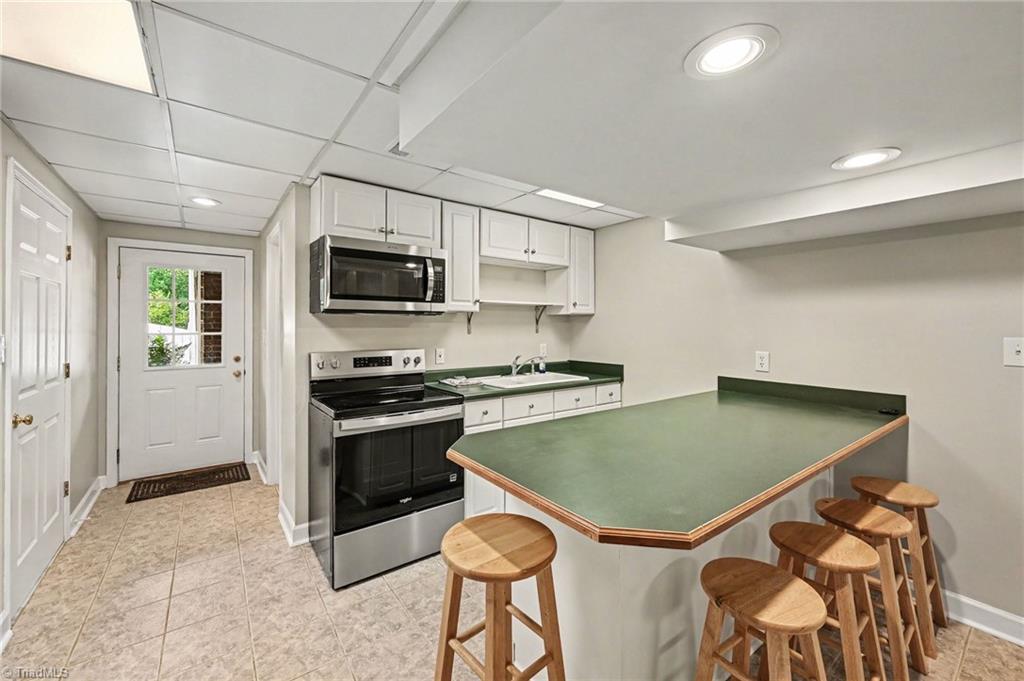 2380 Olde Spring Court Graham, NC 27253 - Photo 28 of 36 Kitchen in Basement