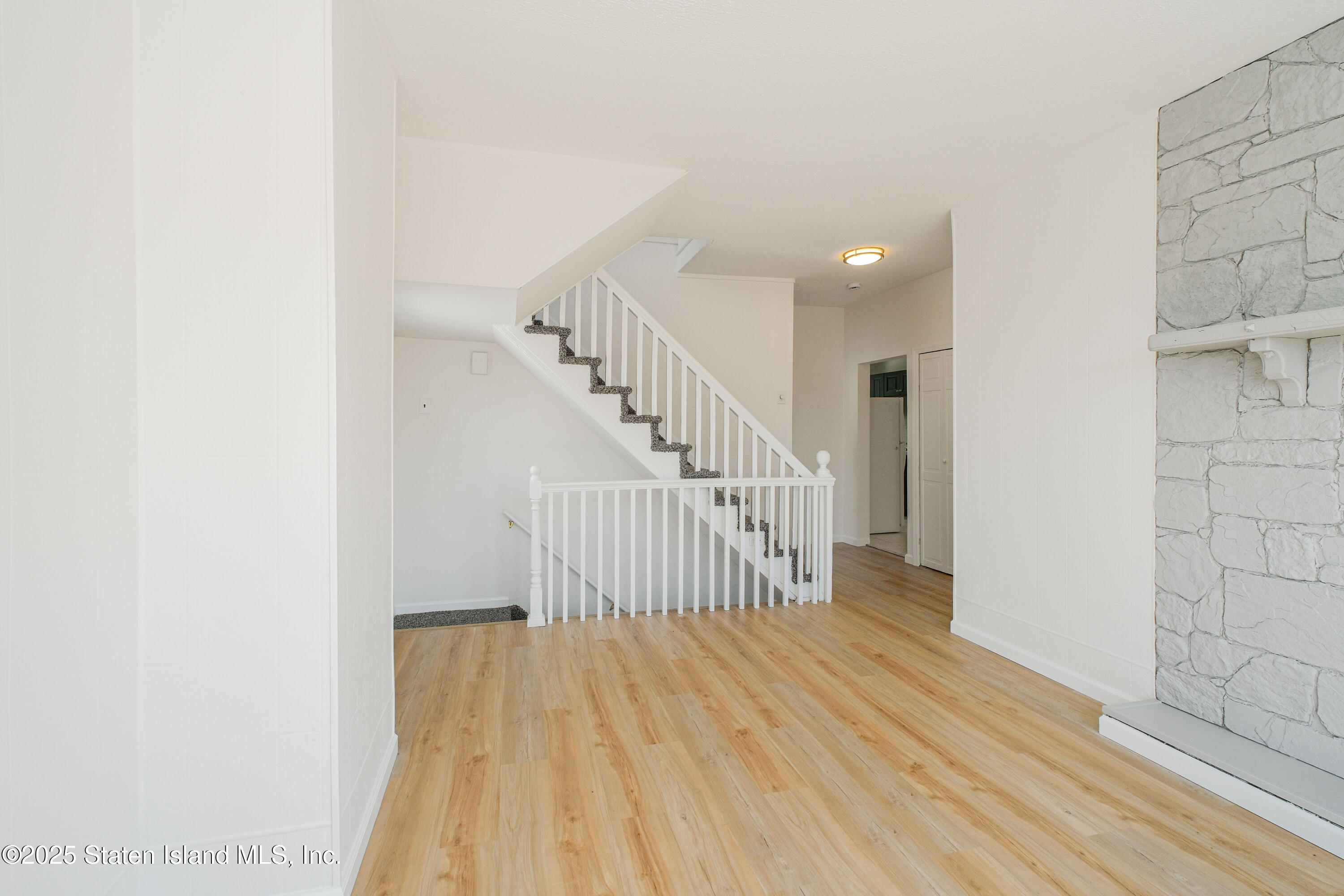 435 Castleton Avenue Staten Island, NY 10301 - Photo 10 of 47 a view of entryway with wooden floor