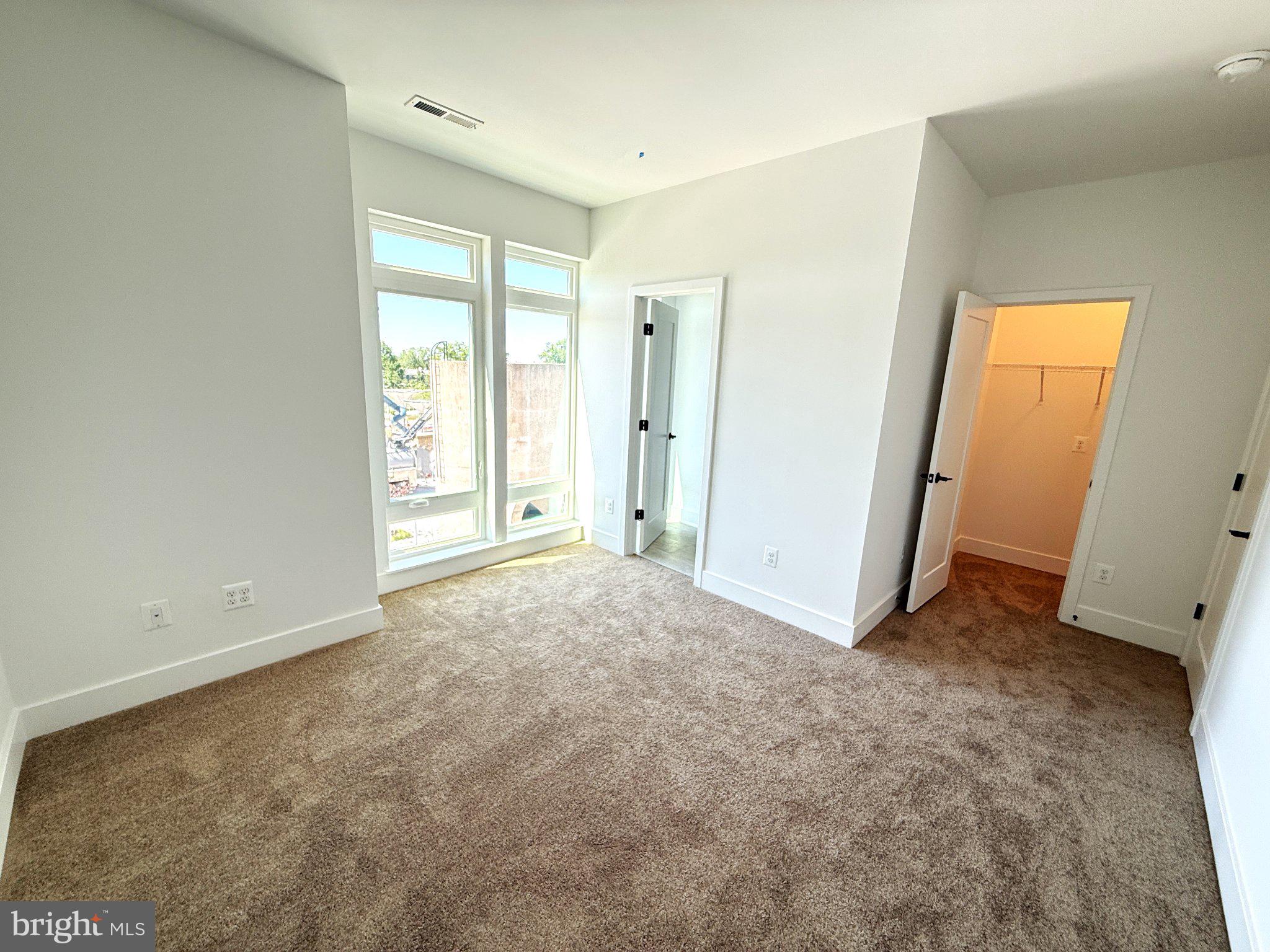 33 Lower Service Court Northwest Washington, DC 20001 - Photo 38 of 51 Bright and airy modern bedroom space.