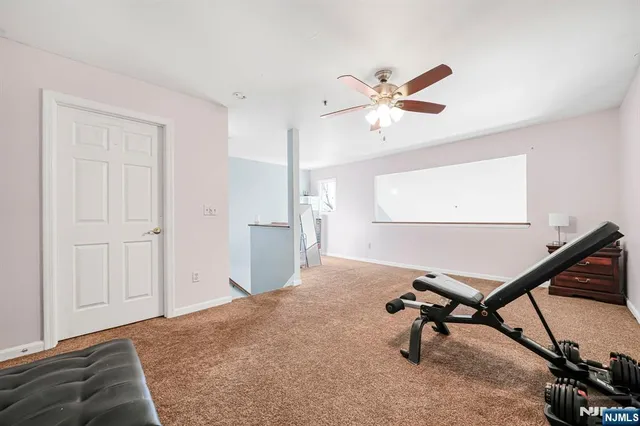 a view of a livingroom with a workspace