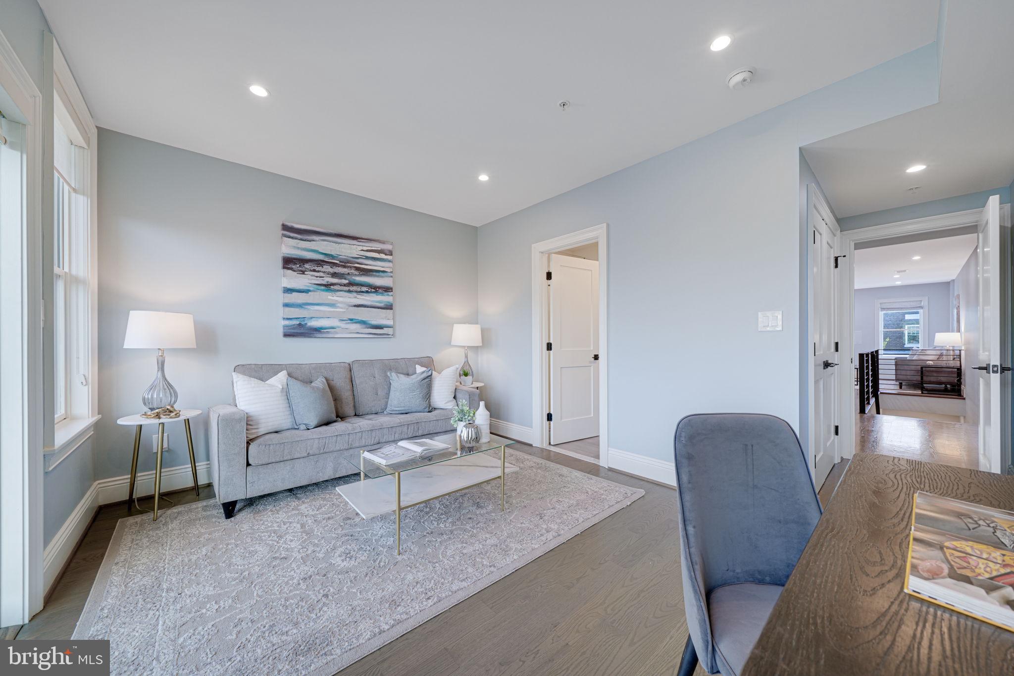 1728 D Street Southeast, Unit 2 Washington, DC 20003 - Photo 14 of 54 a living room with furniture and a couch