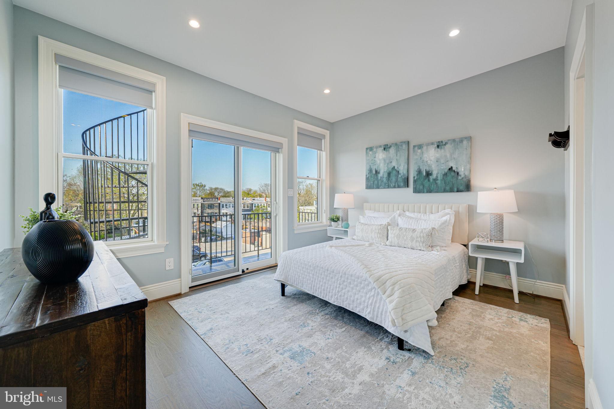 1728 D Street Southeast, Unit 2 Washington, DC 20003 - Photo 21 of 54 a bedroom with a bed and a large window