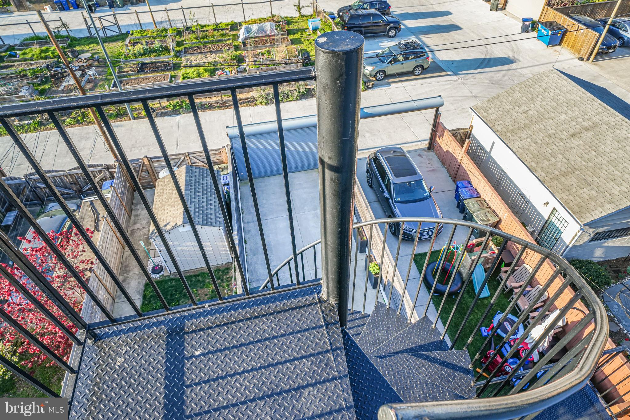 1728 D Street Southeast, Unit 2 Washington, DC 20003 - Photo 25 of 54 a view of a balcony with wooden floor and outdoor seating