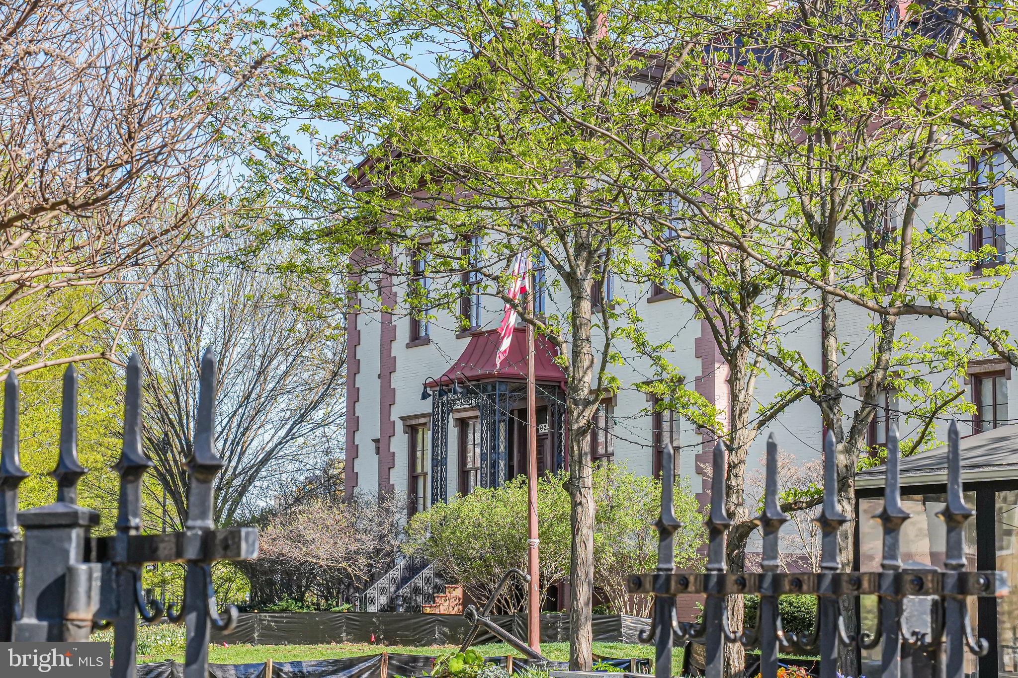 1728 D Street Southeast, Unit 2 Washington, DC 20003 - Photo 46 of 54 a backyard of a house with lots of green space and fountain