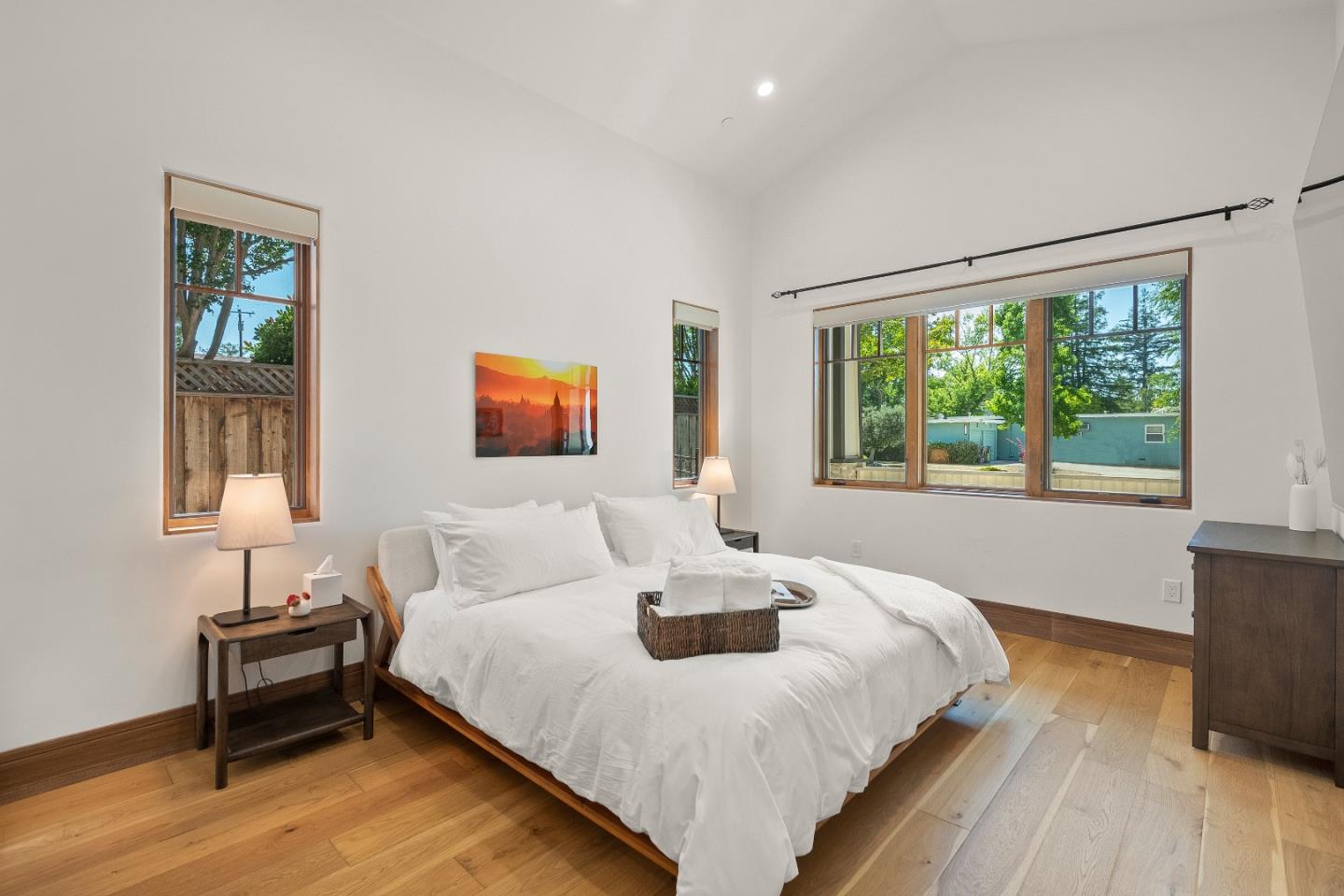 16362 Hilow Road Los Gatos, CA 95032 - Photo 19 of 55 a bedroom with a bed and a large window