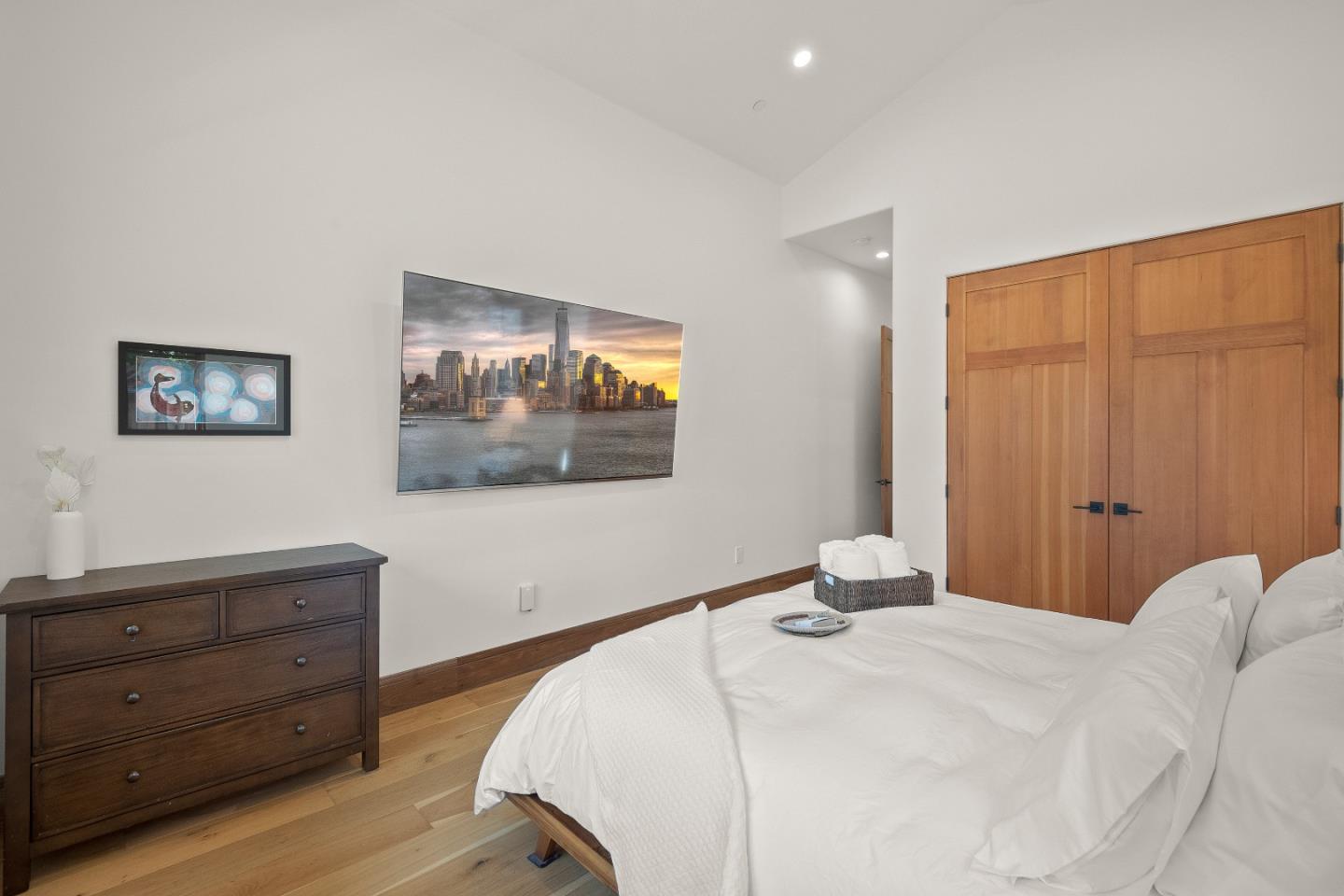 16362 Hilow Road Los Gatos, CA 95032 - Photo 20 of 55 a bedroom with a bed and a dresser