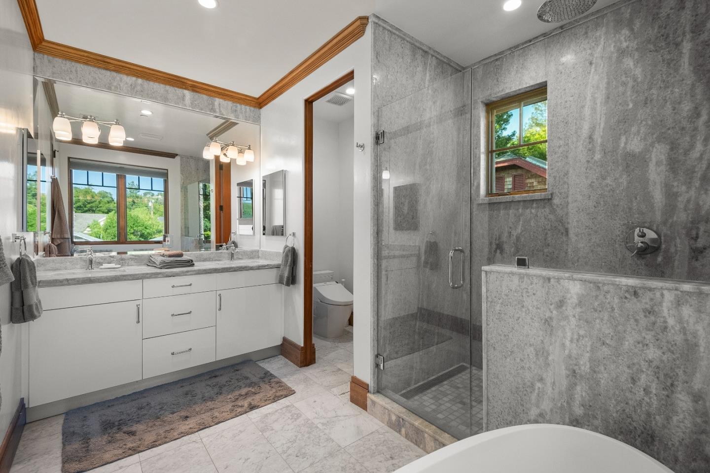 16362 Hilow Road Los Gatos, CA 95032 - Photo 27 of 55 a bathroom with a granite countertop sink mirror vanity and toilet