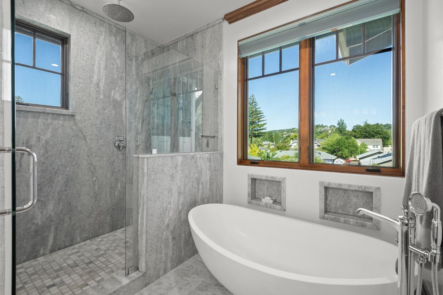 16362 Hilow Road Los Gatos, CA 95032 - Photo 28 of 55 a bathroom with a bathtub and shower