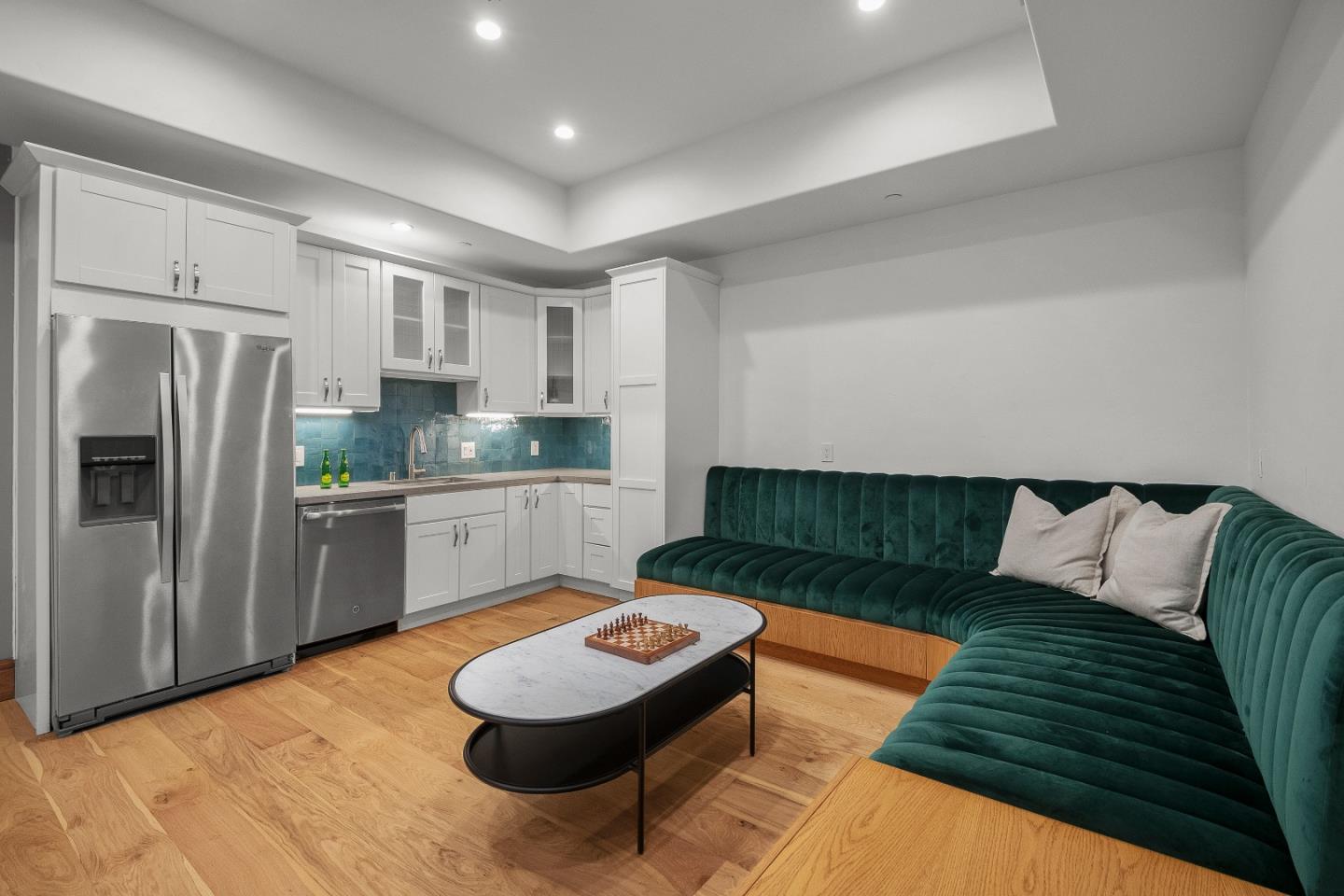 16362 Hilow Road Los Gatos, CA 95032 - Photo 36 of 55 a kitchen with a refrigerator and white cabinets