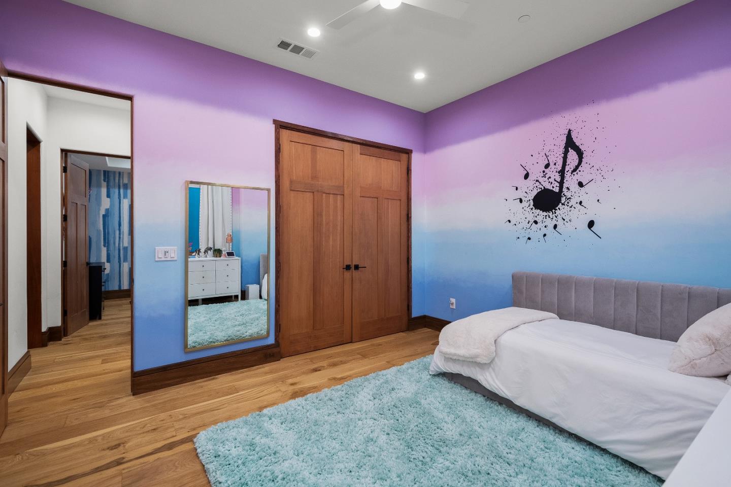 16362 Hilow Road Los Gatos, CA 95032 - Photo 39 of 55 a bedroom with a bed and a mirror