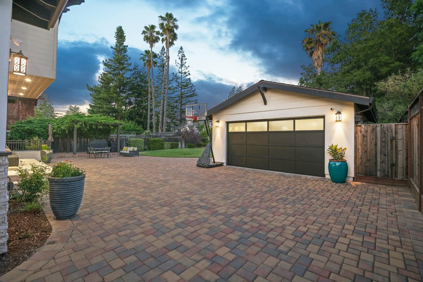 16362 Hilow Road Los Gatos, CA 95032 - Photo 42 of 55 a front view of a house with a yard and garage