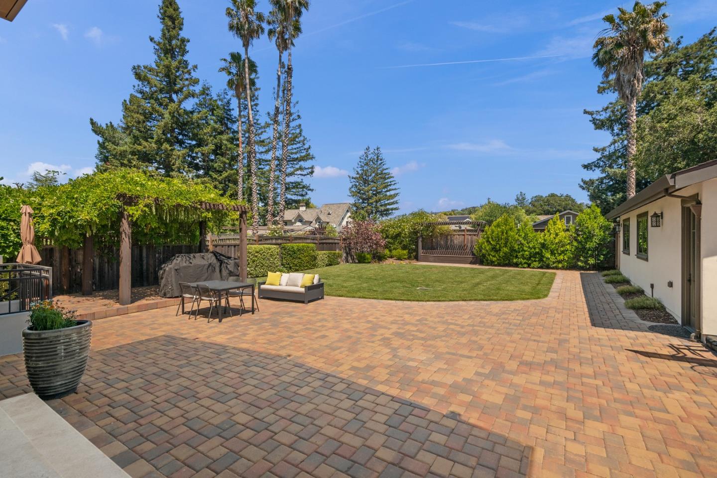 16362 Hilow Road Los Gatos, CA 95032 - Photo 46 of 55 a view of a park with bench and a fire pit