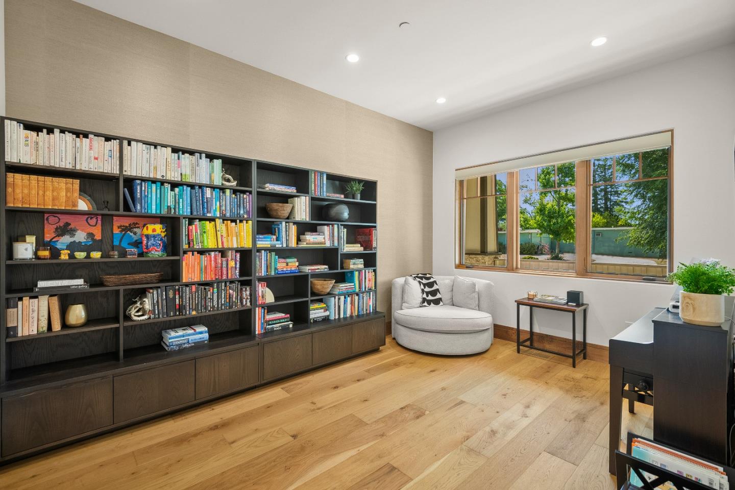 16362 Hilow Road Los Gatos, CA 95032 - Photo 7 of 55 a living room with furniture and a book shelf