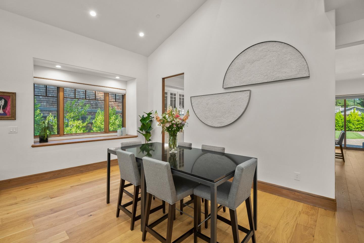 16362 Hilow Road Los Gatos, CA 95032 - Photo 8 of 55 a view of a dining room with furniture window and wooden floor