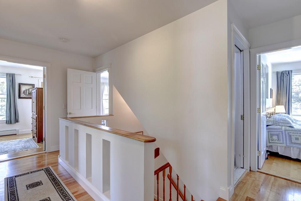 1307 Newbury Neck Road Surry, ME 04684 - Photo 28 of 38 Second floor hallway with door...