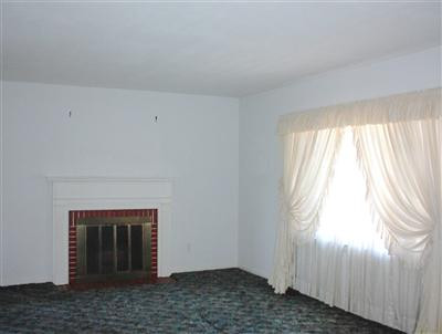 144 Rugby Road Lexington, KY 40504 - Photo 3 of 9 Living room with wood burning fireplace.