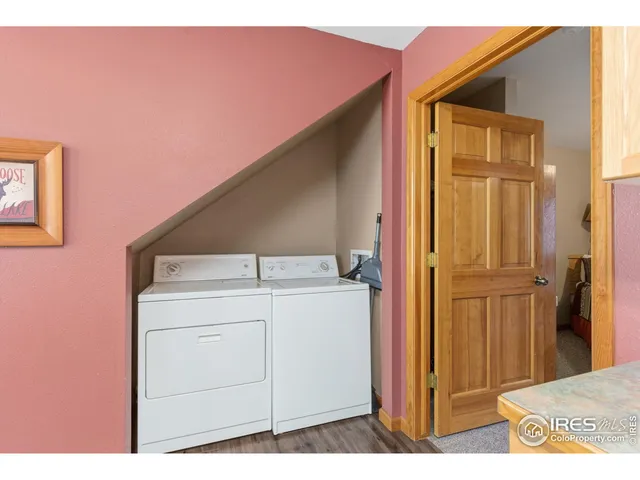 a room with a dresser and a mirror