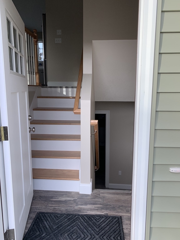 86 Beaumont Avenue Chicopee, MA 01013 - Photo 8 of 8 a view of entryway and hall with wooden floor