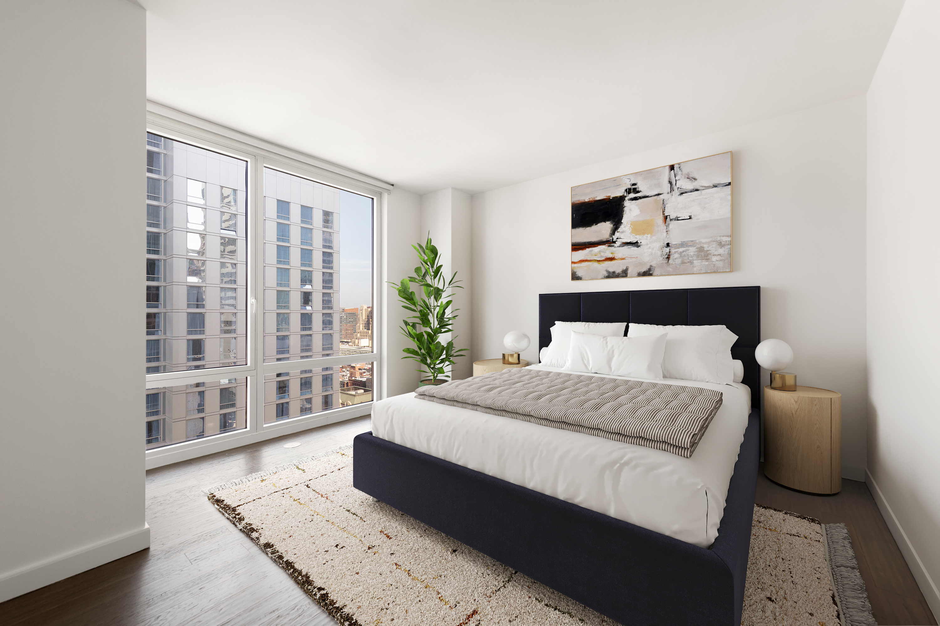 247 West 46th Street, Unit 2203 Manhattan, NY 10036 - Photo 4 of 4 a bedroom with a large bed and a window