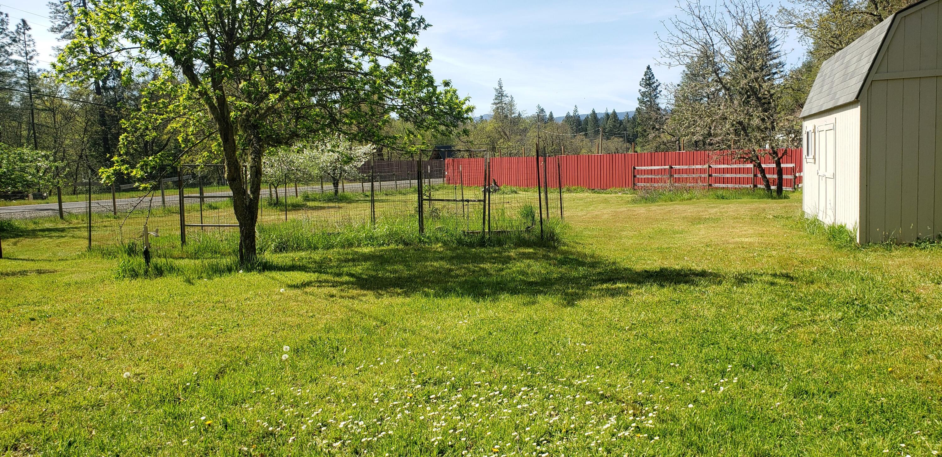 7055 Takilma Road Cave Junction, OR 97523 - Photo 22 of 27 large fenced garden area inside pasture