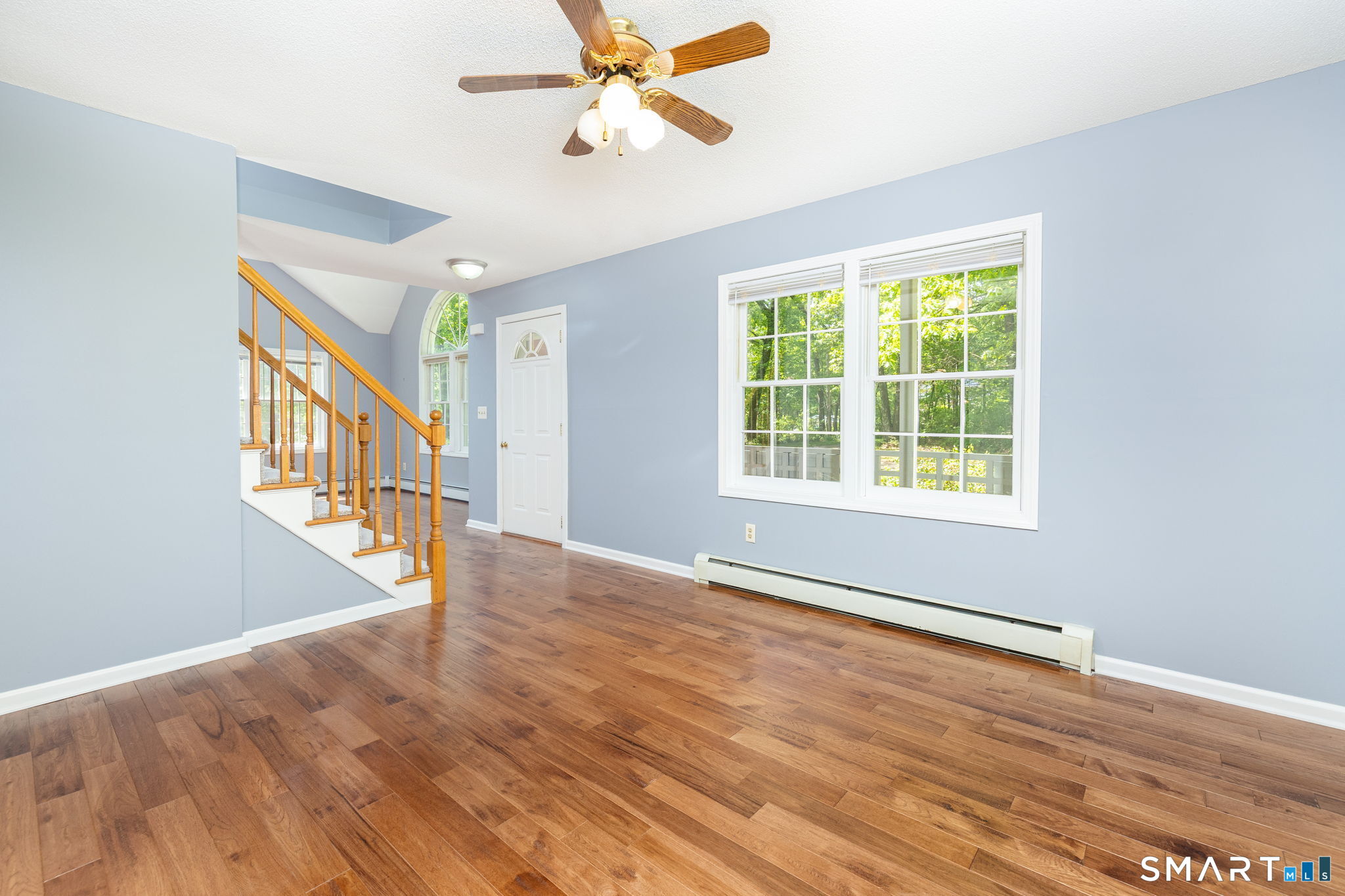175 Vernon Street Manchester, CT 06042 - Photo 12 of 38 a view of an empty room with wooden floor and a window