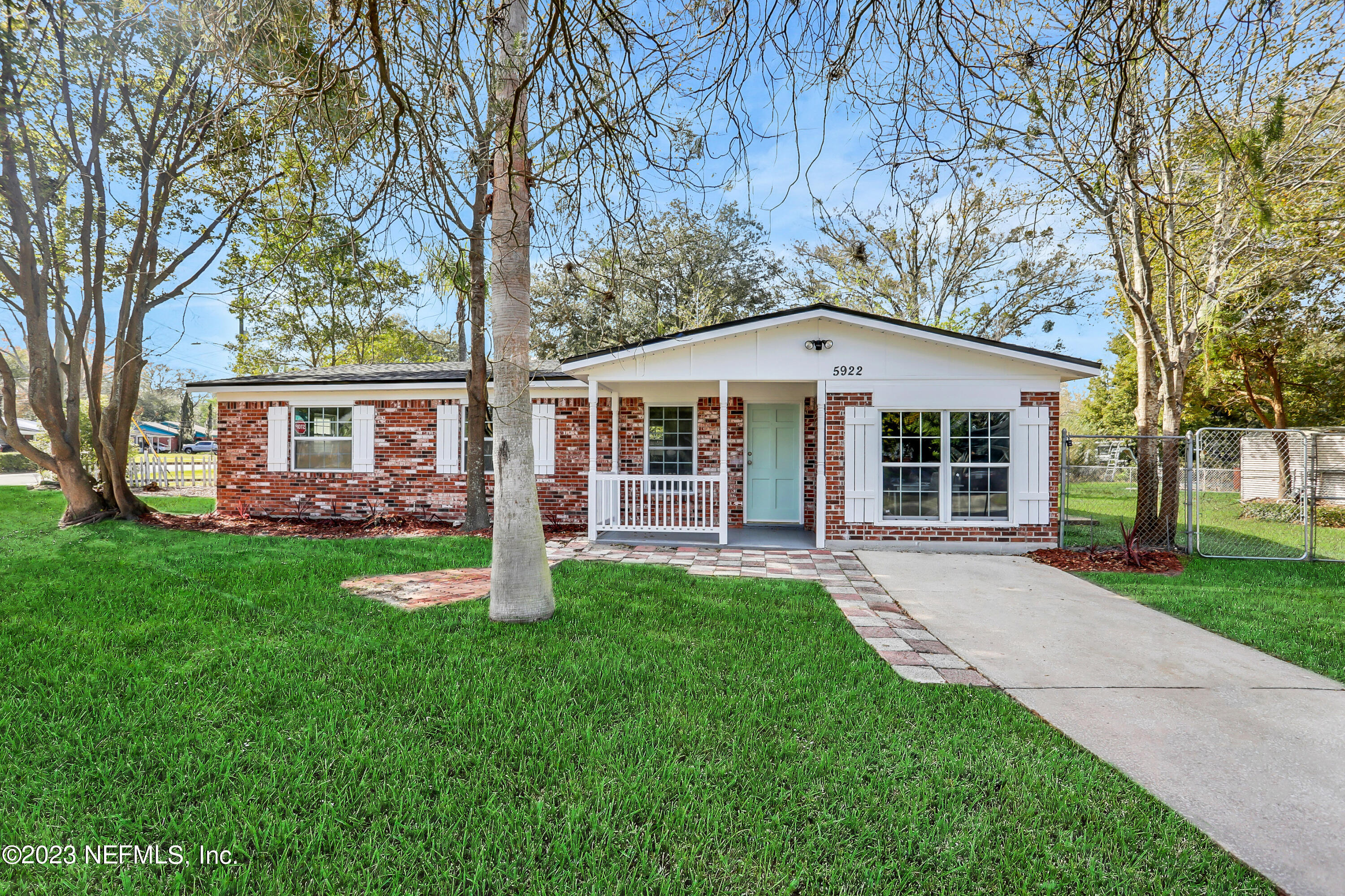 5922 Ridgeway Road East Jacksonville, FL 32244 - Photo 1 of 35 front view of a house with a yard