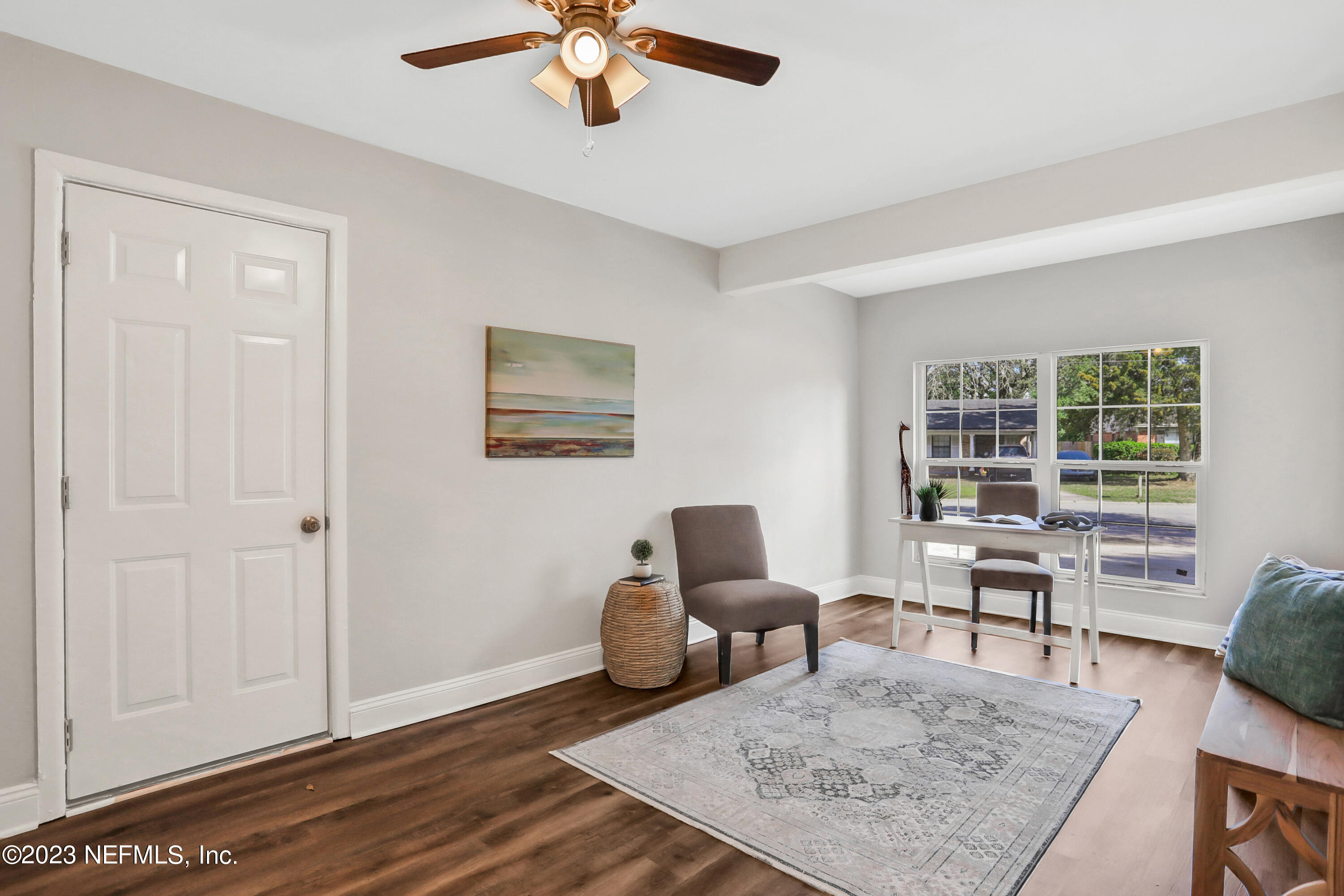 5922 Ridgeway Road East Jacksonville, FL 32244 - Photo 11 of 35 a living room with furniture rug and window