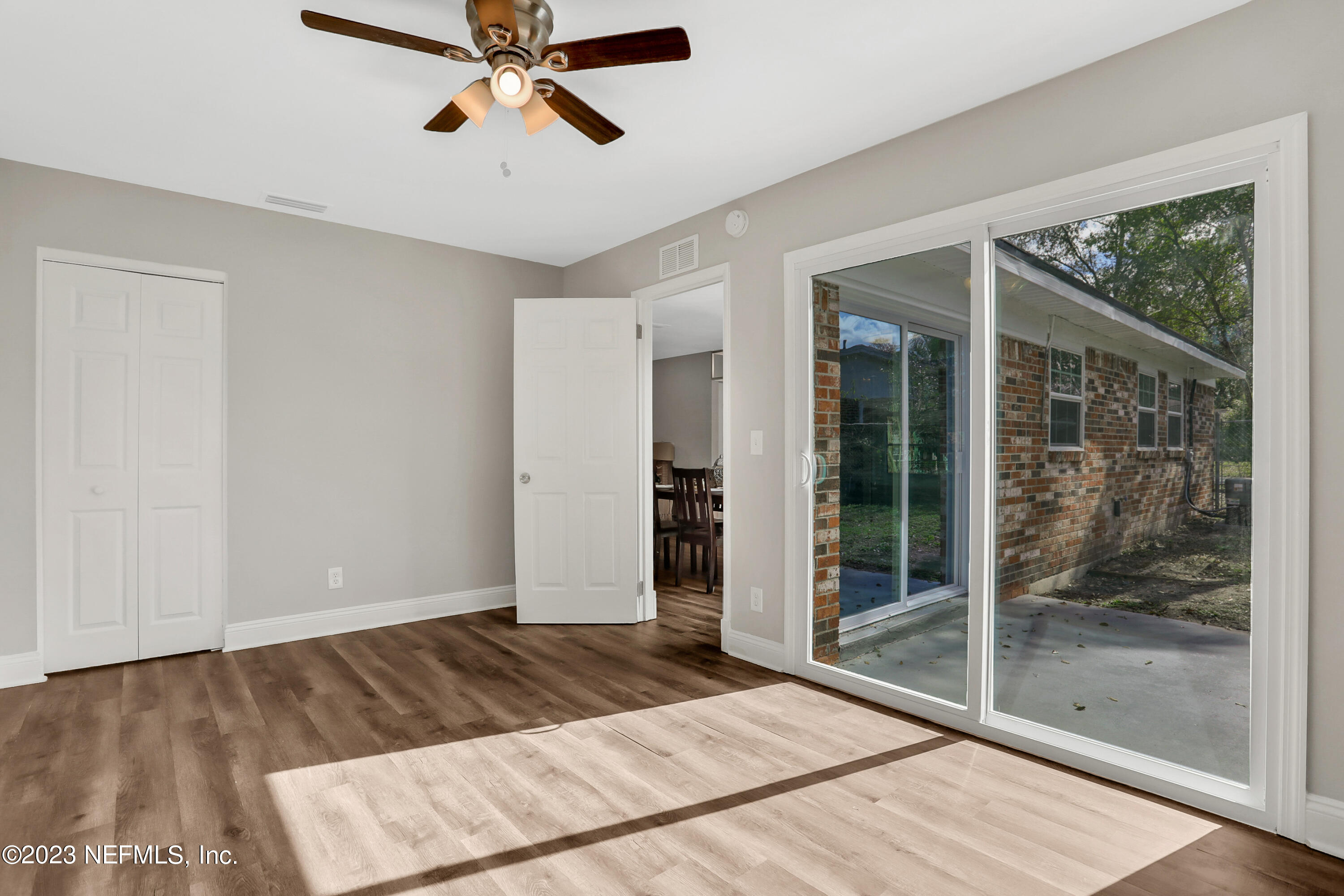 5922 Ridgeway Road East Jacksonville, FL 32244 - Photo 29 of 35 a bedroom with a bed and a window