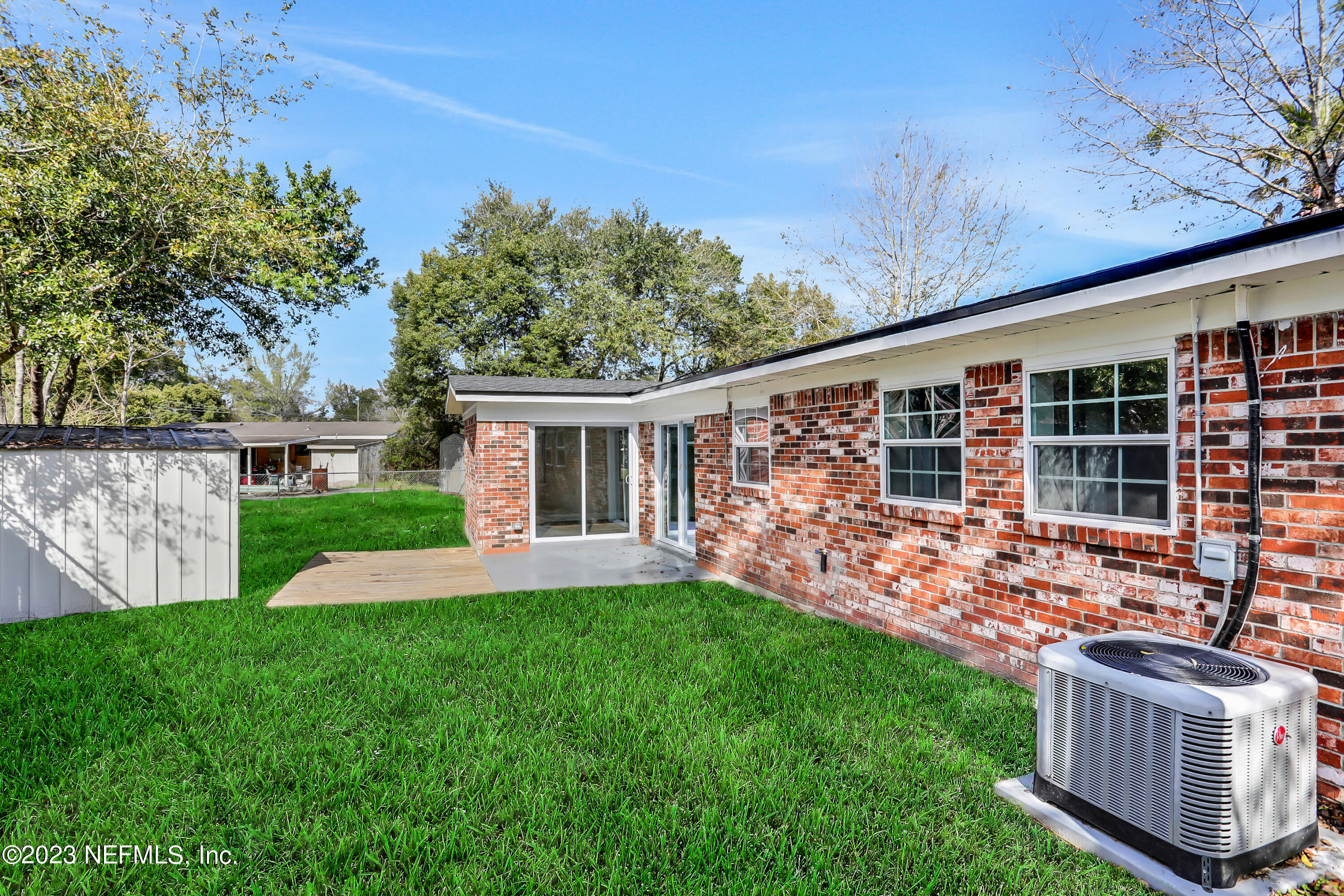 5922 Ridgeway Road East Jacksonville, FL 32244 - Photo 31 of 35 front view of a house with a yard