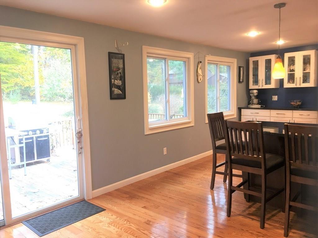 1 Edgar Road Billerica, MA 01821 - Photo 14 of 32 a view of a dining room with furniture and wooden floor