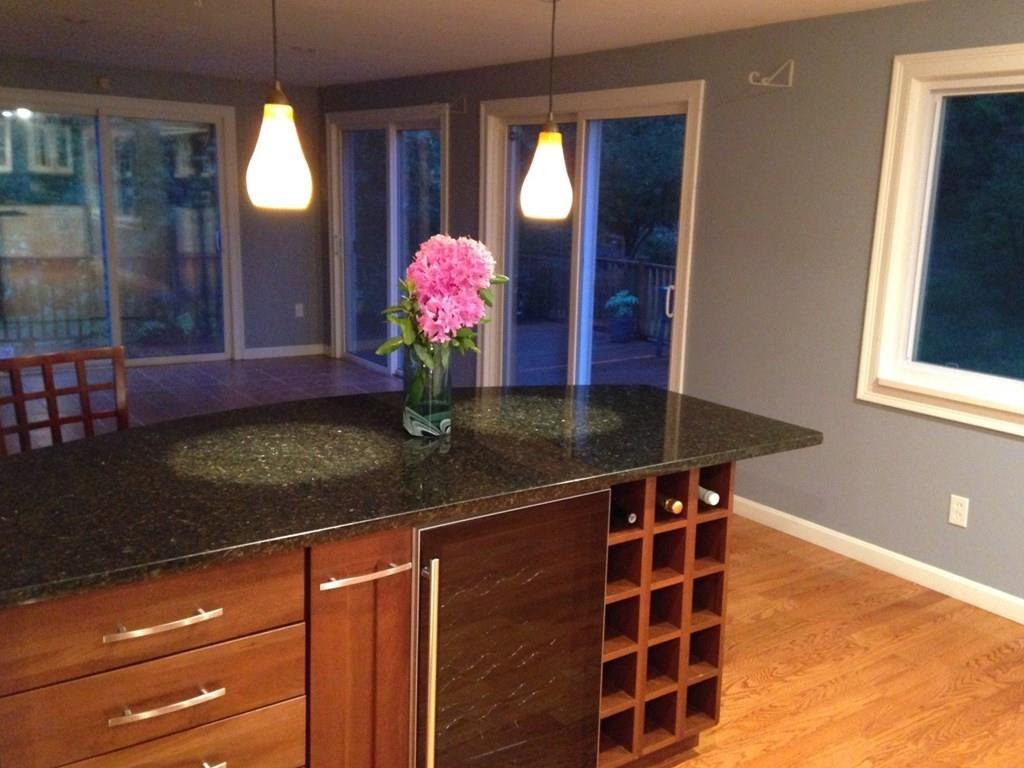 1 Edgar Road Billerica, MA 01821 - Photo 16 of 32 a view of kitchen with granite countertop sink and wooden floor