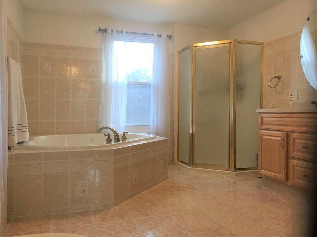 1 Edgar Road Billerica, MA 01821 - Photo 22 of 32 a bathroom with a bathtub and a shower